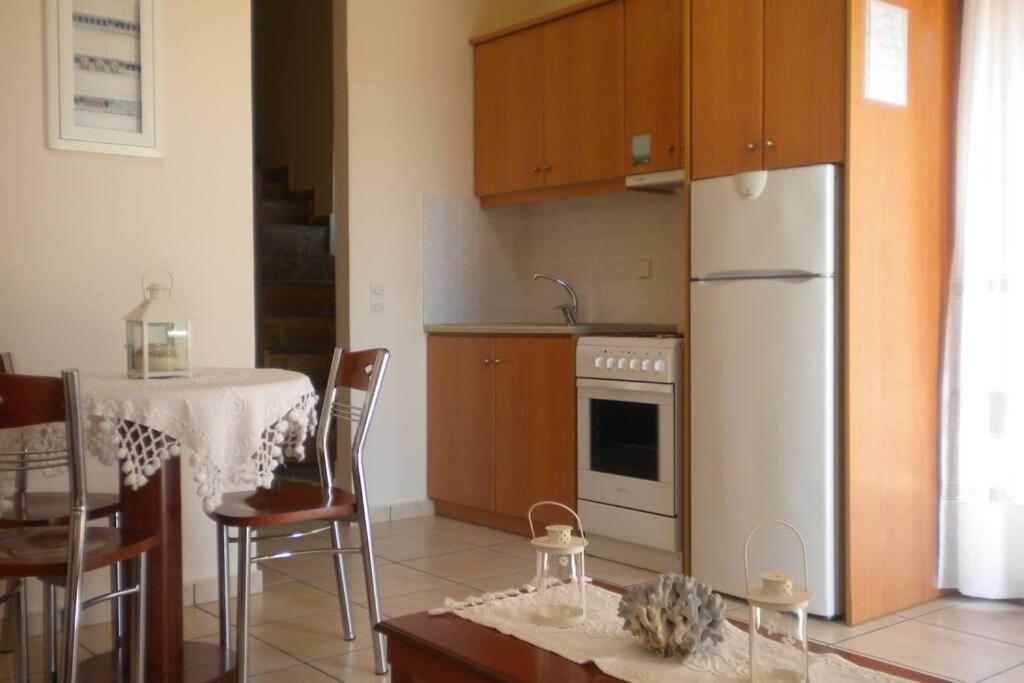 Markos Apartments 1 Stoupa Bagian luar foto
