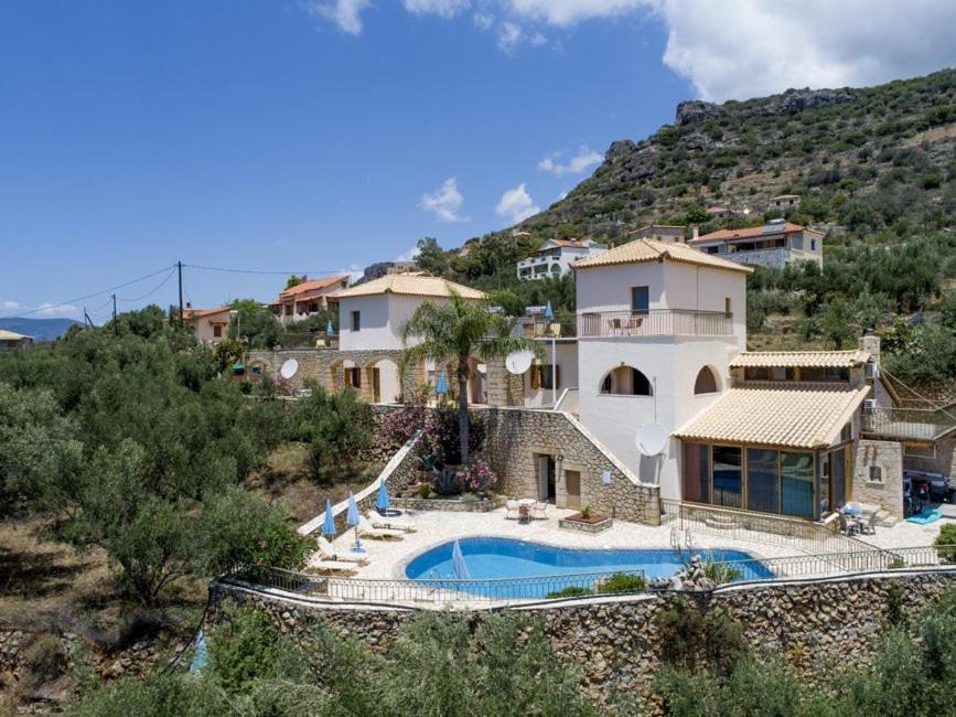 Markos Apartments 1 Stoupa Bagian luar foto